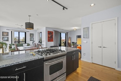 Nestled in the heart of downtown, this modern boutique building - photo 3