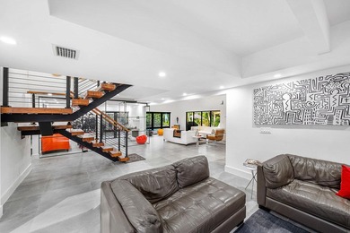 A refreshed two-story mid-century modern residence, this home is - photo 13