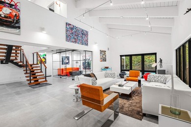 A refreshed two-story mid-century modern residence, this home is - photo 14