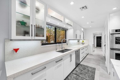 A refreshed two-story mid-century modern residence, this home is - photo 23