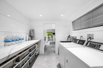 A refreshed two-story mid-century modern residence, this home is - photo 25
