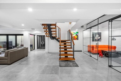 A refreshed two-story mid-century modern residence, this home is - photo 40