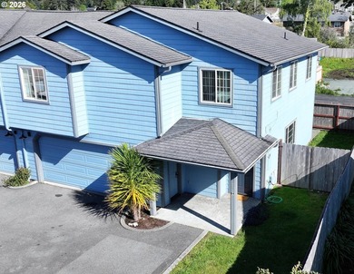 Three bedrooms and a spacious two-level layout set the tone for - photo 1