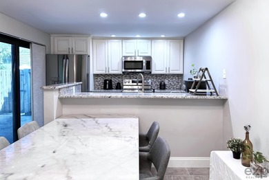 Rare opportunity to own a turn-key renovated home in West Palm - photo 11