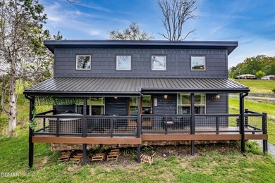 Welcome to this beautifully crafted 2-bedroom, 1-bath cabin - photo 1