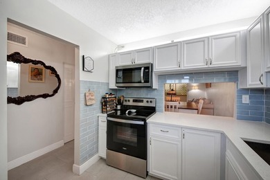 Beautifully updated 2-bedroom, 1-bathroom first-floor condo - photo 11