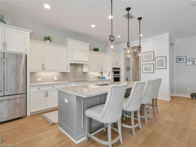 Move in ready and loaded with upgrades, this custom built Stock - photo 14
