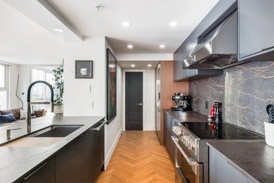 Welcome to this exquisitely renovated 2 bed, 2 bath residence in - photo 16
