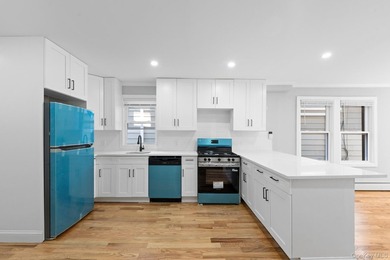 Welcome to 142-06-116th Avenue! A newly renovated, turn key - photo 3