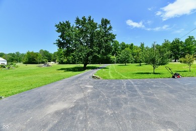 Tucked away on a quiet lot that COMBINES a spacious lawn with a - photo 2