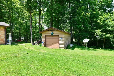 Tucked away on a quiet lot that COMBINES a spacious lawn with a - photo 6