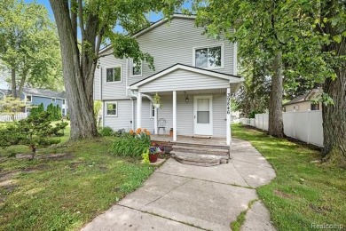 Lake Home For Sale in Harrison Township, Michigan