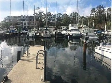 Windmill Harbour Boat Slip #C-61, located within the gated and - photo 1