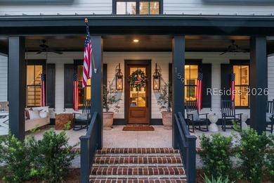Gracefully positioned on a half-acre homesite overlooking one of - photo 2