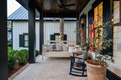 Gracefully positioned on a half-acre homesite overlooking one of - photo 4
