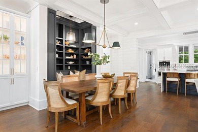 Gracefully positioned on a half-acre homesite overlooking one of - photo 9