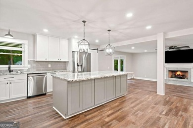 Welcome home to this beautifully renovated 3-bedroom, 2-bathroom - photo 11