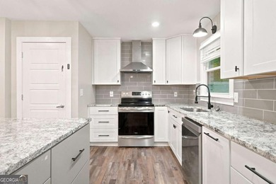 Welcome home to this beautifully renovated 3-bedroom, 2-bathroom - photo 13