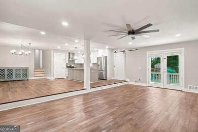 Welcome home to this beautifully renovated 3-bedroom, 2-bathroom - photo 16