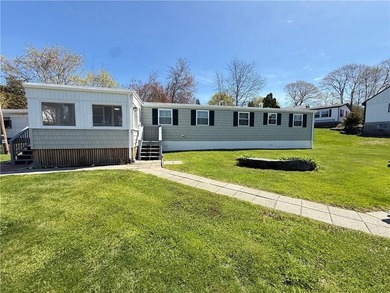 Enjoy coastal living with access to Nannaquaket Pond through - photo 2