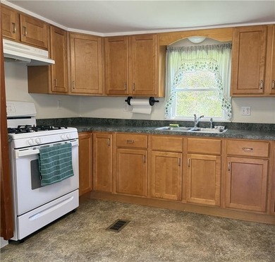 Enjoy coastal living with access to Nannaquaket Pond through - photo 3