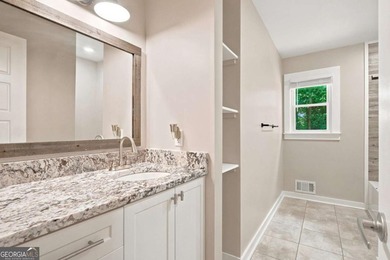 Welcome home to this beautifully renovated 3-bedroom, 2-bathroom - photo 29