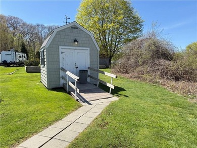 Enjoy coastal living with access to Nannaquaket Pond through - photo 10