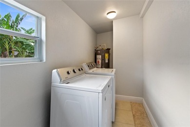 This meticulously renovated property features a new, detached - photo 11