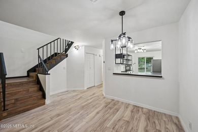 Beautifully updated condo where modern finishes, functional - photo 11