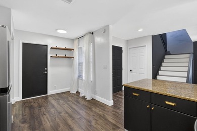 Spacious townhouse with Brand New Roof, newer plumbing, and new - photo 11