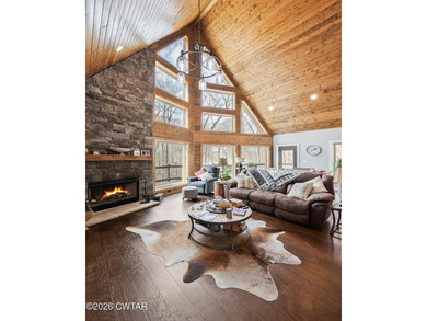 Beautiful custom lake home on 2+ acre waterfront lot with dock - photo 12