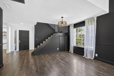 Spacious townhouse with Brand New Roof, newer plumbing, and new - photo 14