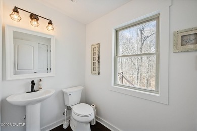 Beautiful custom lake home on 2+ acre waterfront lot with dock - photo 36