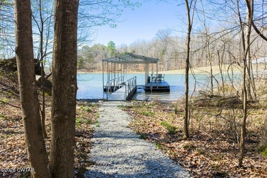 Beautiful custom lake home on 2+ acre waterfront lot with dock - photo 42