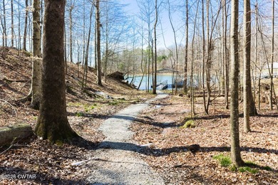 Beautiful custom lake home on 2+ acre waterfront lot with dock - photo 49