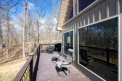 Beautiful custom lake home on 2+ acre waterfront lot with dock - photo 50