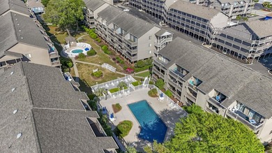 Just a short walk to the beach, this updated 2-bedroom, 2-bath - photo 3