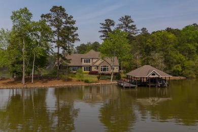 Welcome to this custom oasis nestled on 2.27 pristine waterfront - Lake Home Sale Pending in Hamilton, Georgia