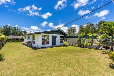 Tucked away in the lush, peaceful setting of Wahiawa Heights - photo 1