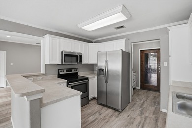 Enjoy peaceful living near beautiful Cedar Creek Lake in this - photo 12