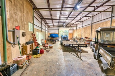 Nestled in a tranquil, 23 Acre wooded setting, this charming - photo 31