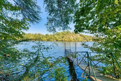 Nestled in a tranquil, 23 Acre wooded setting, this charming - photo 36