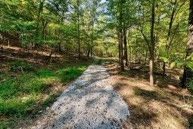 Nestled in a tranquil, 23 Acre wooded setting, this charming - photo 42