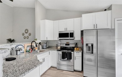 Welcome to 9616 River Walk Ct, a charming 2-bedroom, 2-bathroom - photo 3
