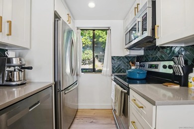 Welcome to this well-designed La Costa townhome offering a - photo 3