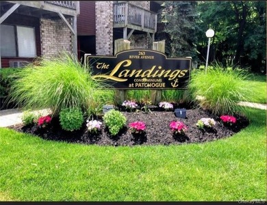 Waterfront Condo community in Patchogue Village on 1st floor! - photo 1