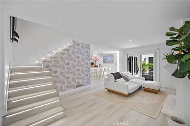Welcome to modern, resort-style living on Lido Isle. Extensively - photo 4