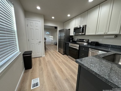 Remodeled Duplex, currently being used as an . It comes fully - photo 12