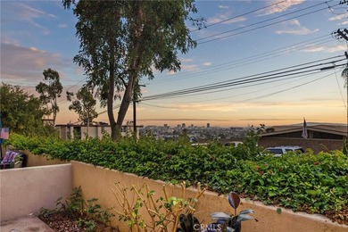 Perched in Signal Hill, this rare single-level 2-bed, 2-bath - photo 16