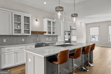Indulge in luxury at this exquisite Triangle Park townhome. It's - photo 5